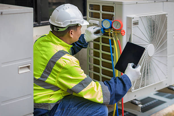 Professional Hvac Maintenance technician working in Slinger, WI